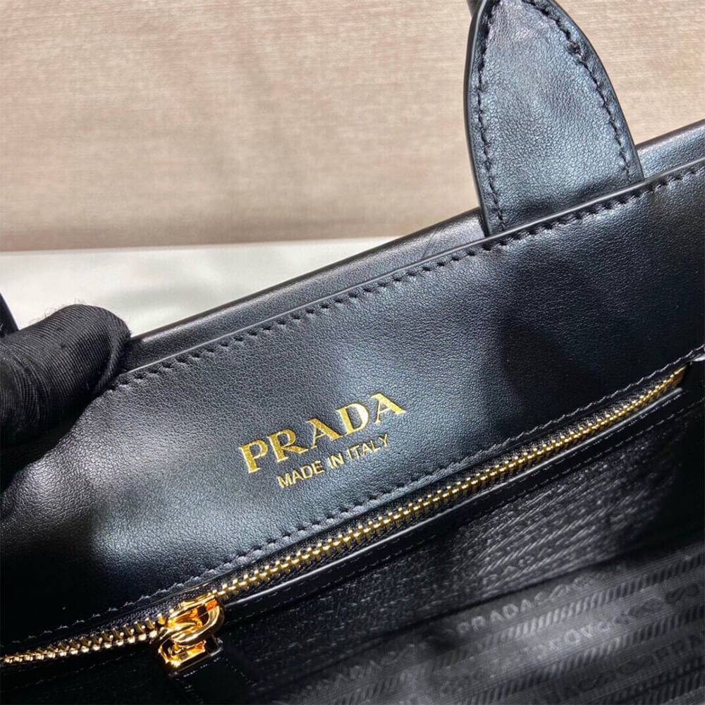 Pra*a Small leather Pra*a Symbole bag with topstitching