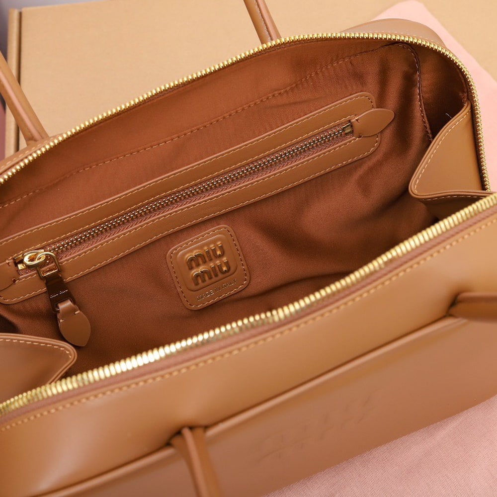 M1um1u Medium Beau leather top-handle bag(HIGH-END GRADE)