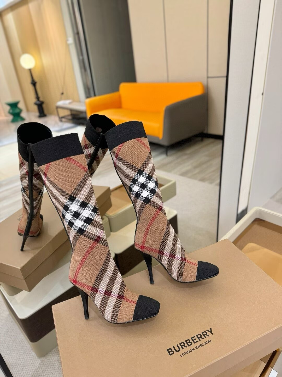 ua Bv*b*rry check high boots