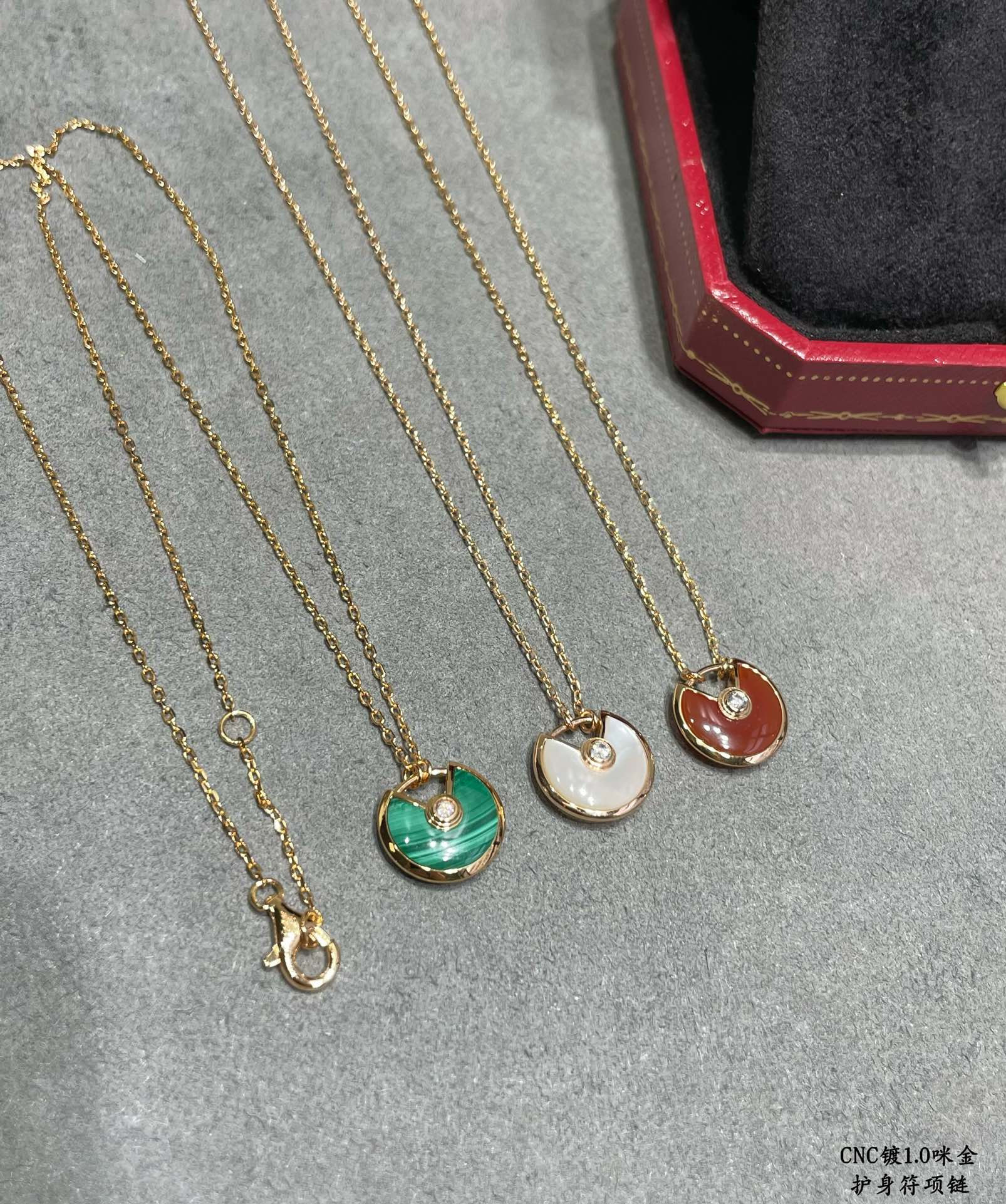 Ca*t1er Amulet Necklace