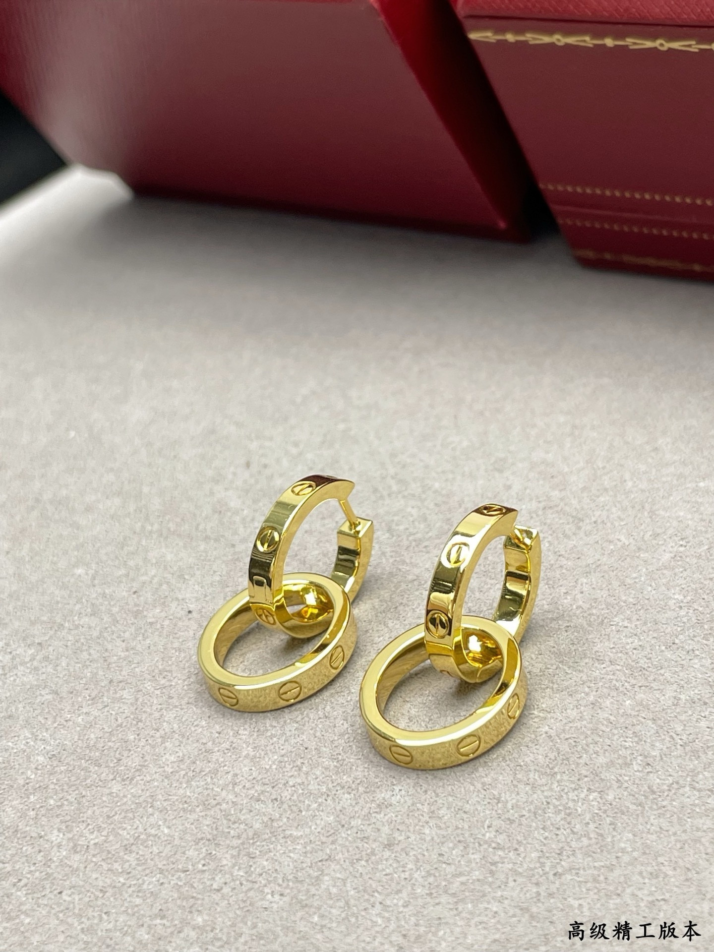 Ca*t1er Double Ring Polished Earrings