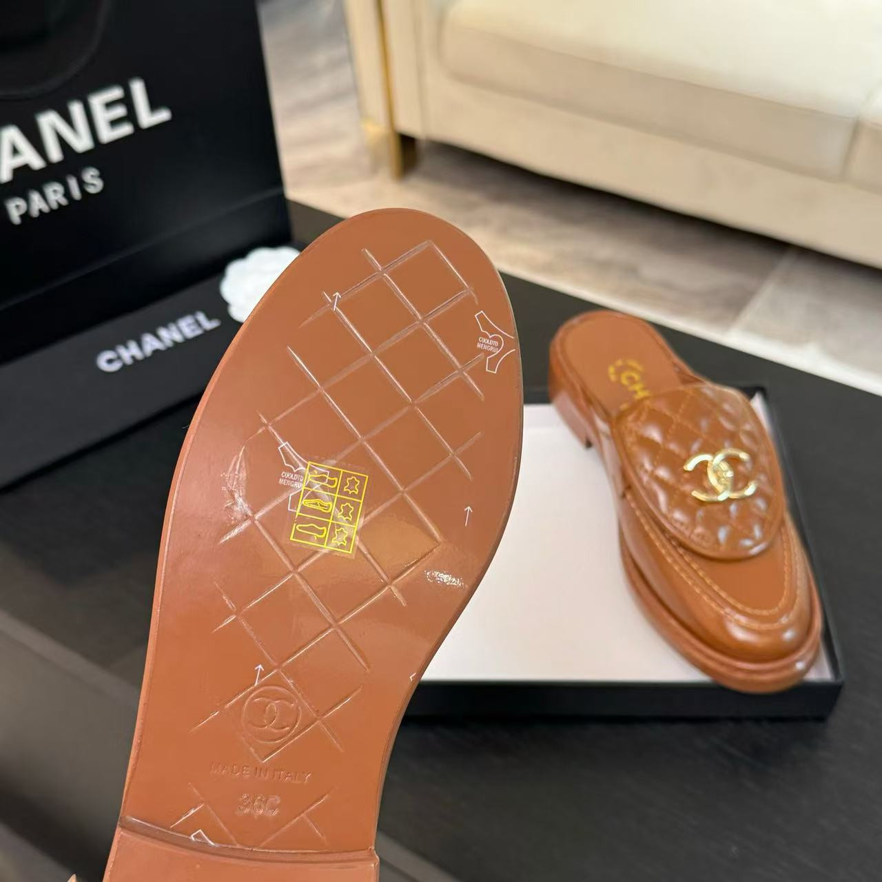 UA Ch**el Slides Leather Flats
