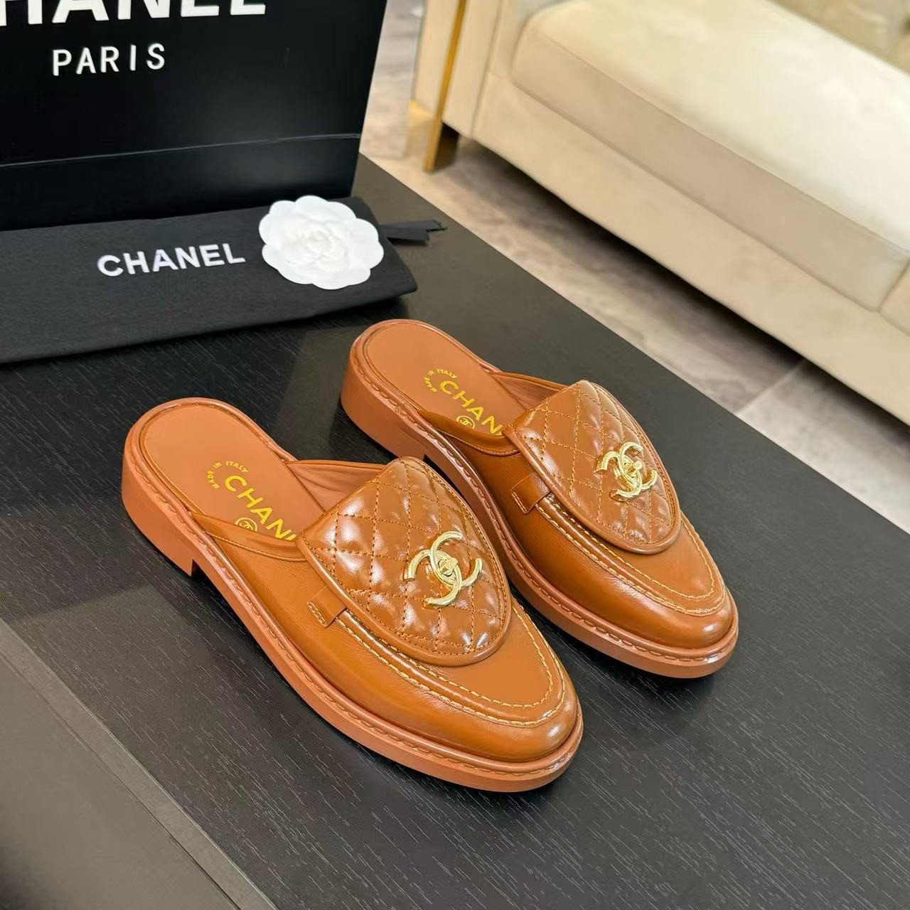 UA Ch**el Slides Leather Flats