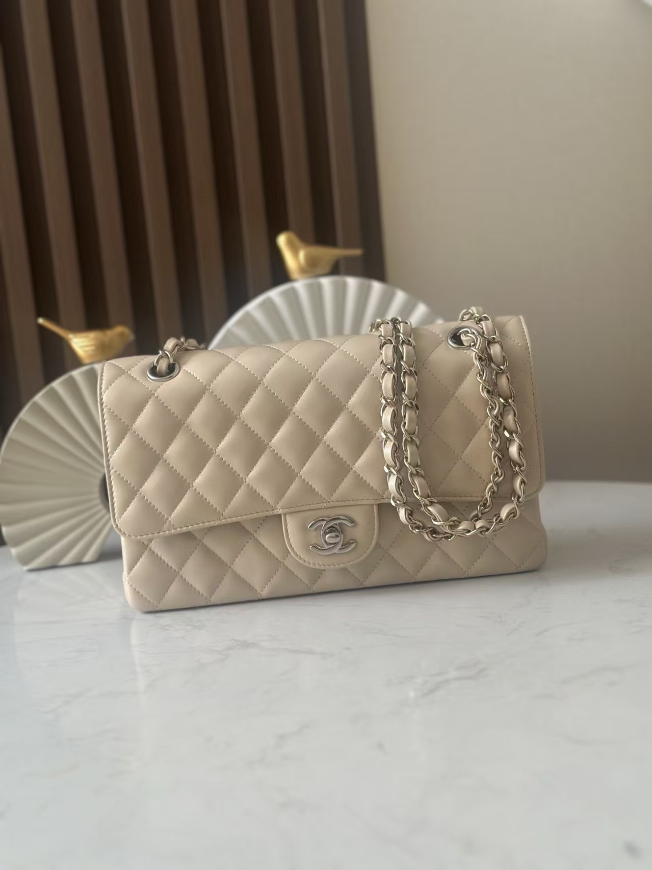 Ch**el Classic Flap Bag Pearlescent apricot-colored lambskin with silver hardware 15x25.5x6cm