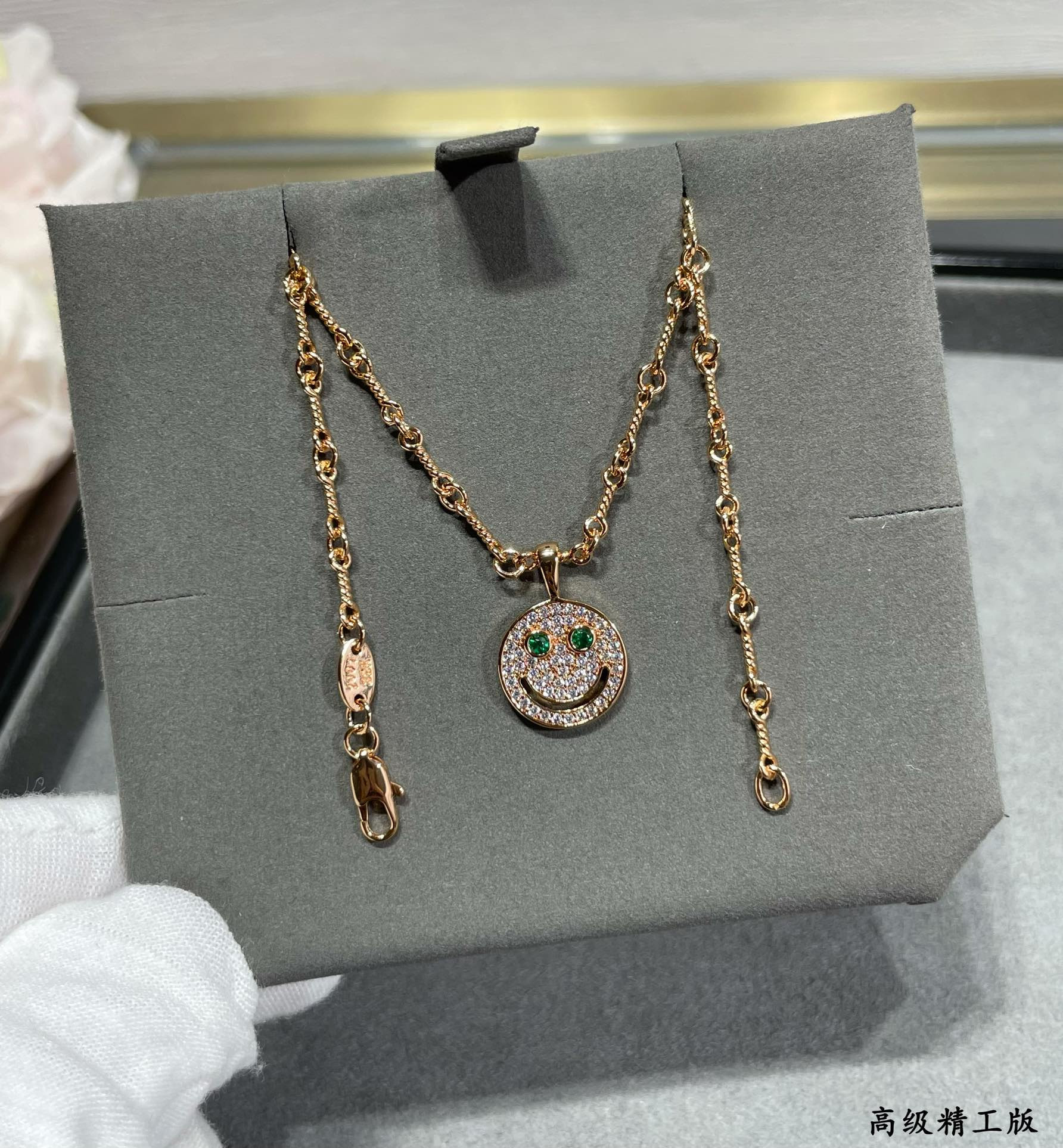 ch*0me he**ts round smiley Fa*e necklace