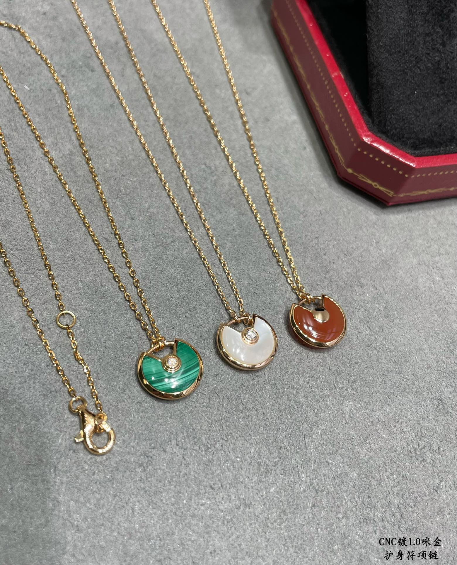 Ca*t1er Amulet Necklace