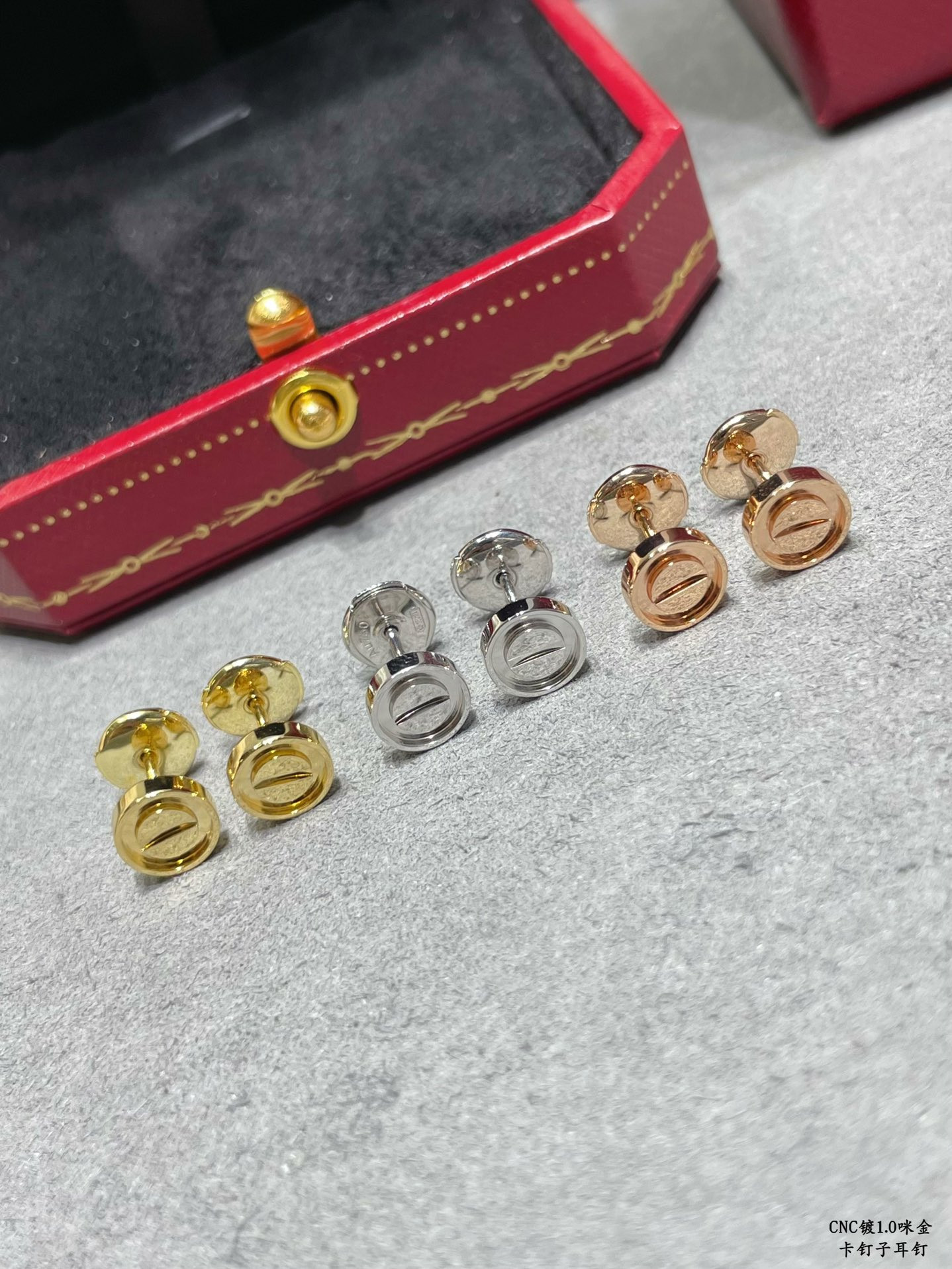 Ca*t1er nail earrings