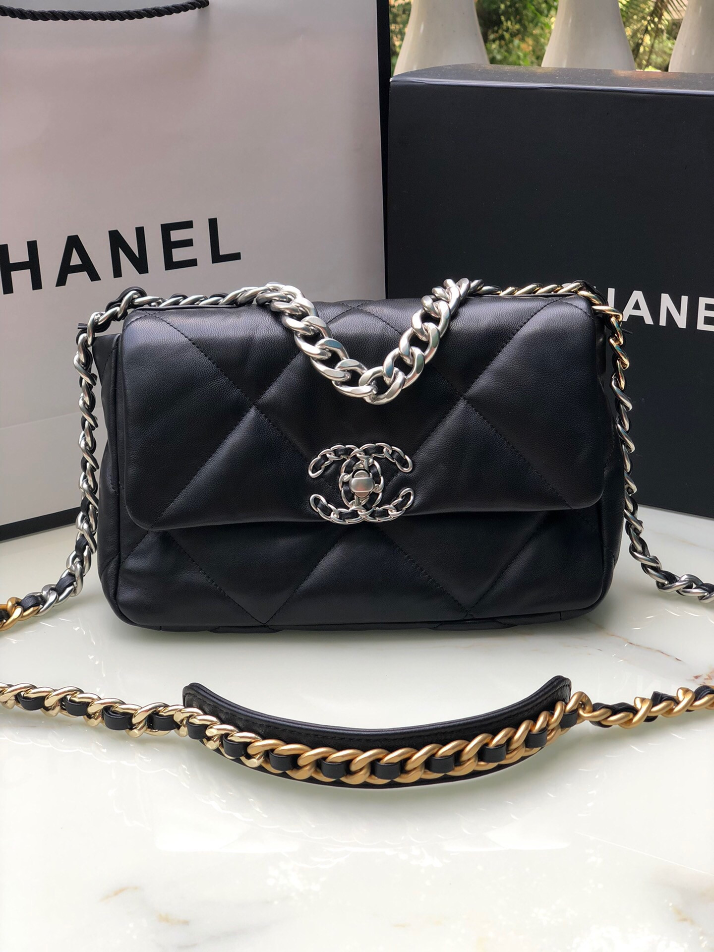 Ch**el 19 HANDBAG Shiny Leather, Gold-Tone, Silver-Tone & Ruthenium-Finish Metal Black 6.2 × 10.1 × 3.5 in