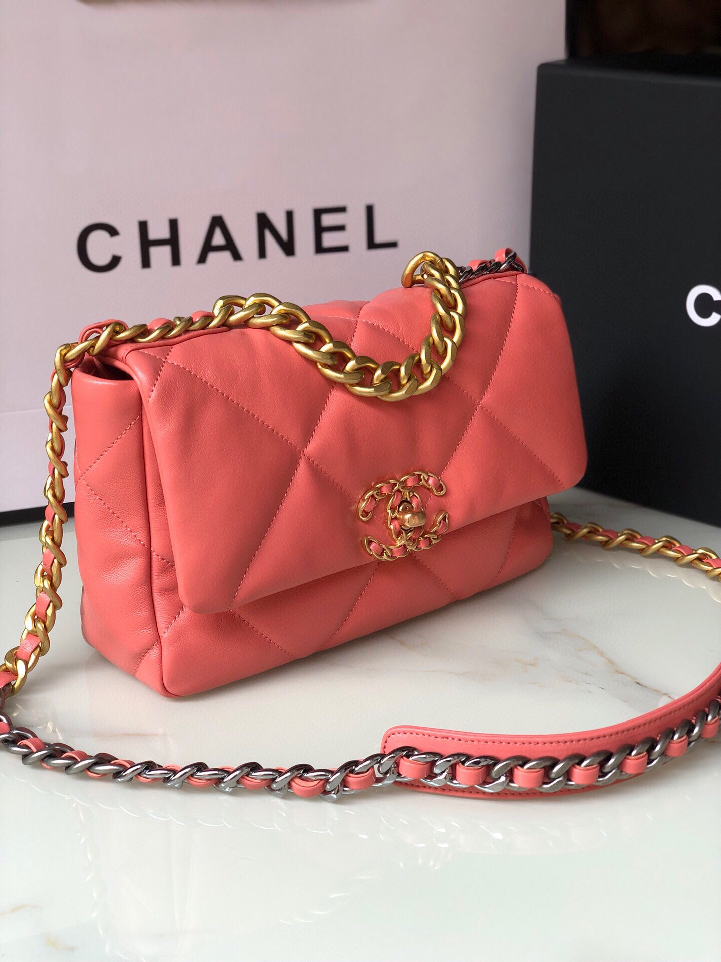 Ch**el 19 HANDBAG Shiny Pink Gold-Tone, Silver-Tone & Ruthenium-Finish Metal 6.2 × 10.1 × 3.5 in