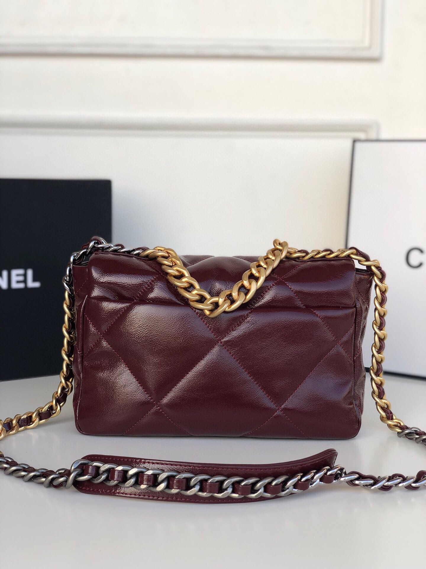 Ch**el 19 HANDBAG Shiny Leather, Gold-Tone, Silver-Tone & Ruthenium-Finish Metal Dark Red 6.2 × 10.1 × 3.5 in