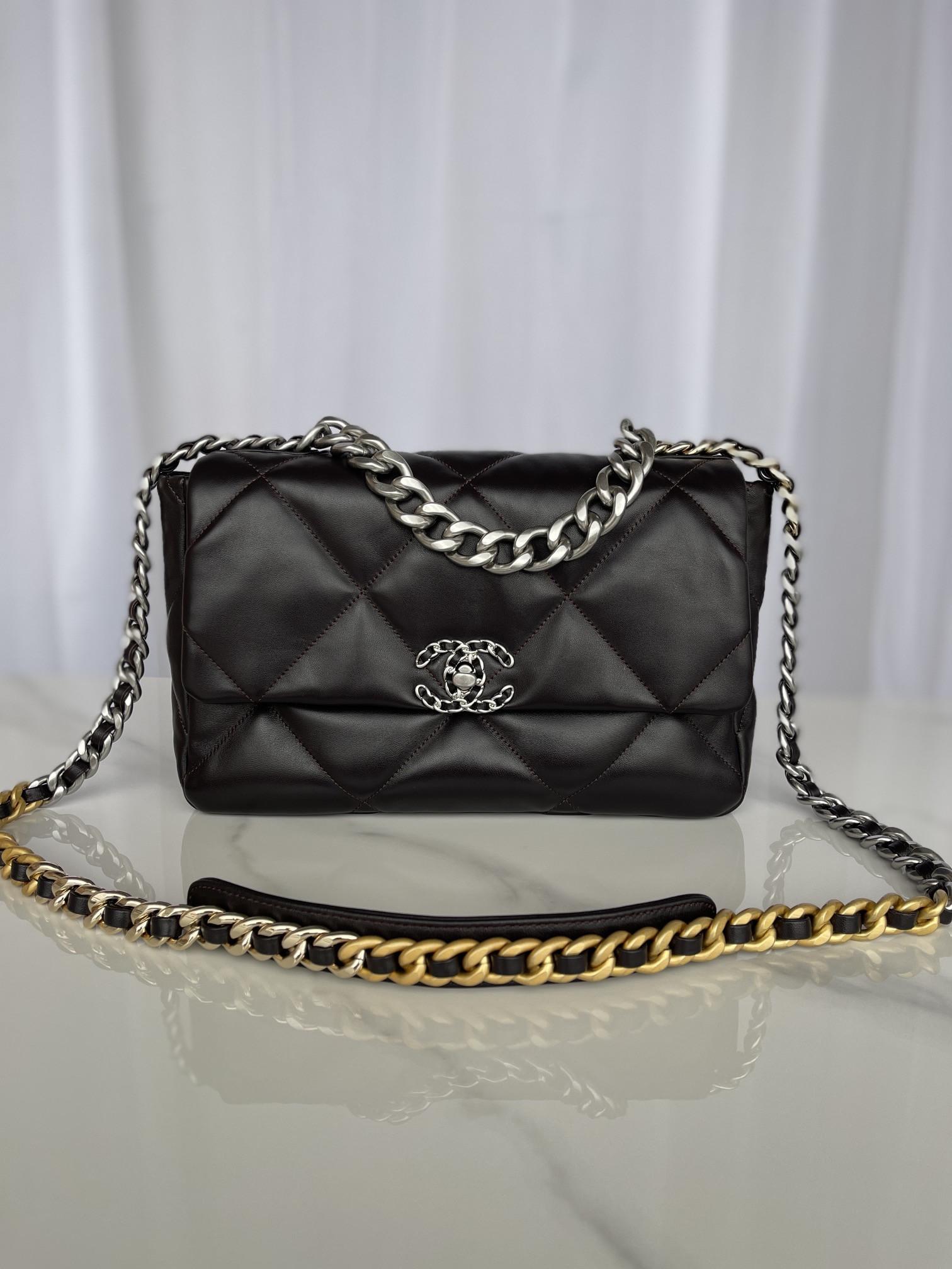 Ch**el 19 LARGE HANDBAG Shiny Leather Black, Gold-Tone, Silver-Tone & Ruthenium-Finish Metal 7.8 × 11.7 × 3.9 in