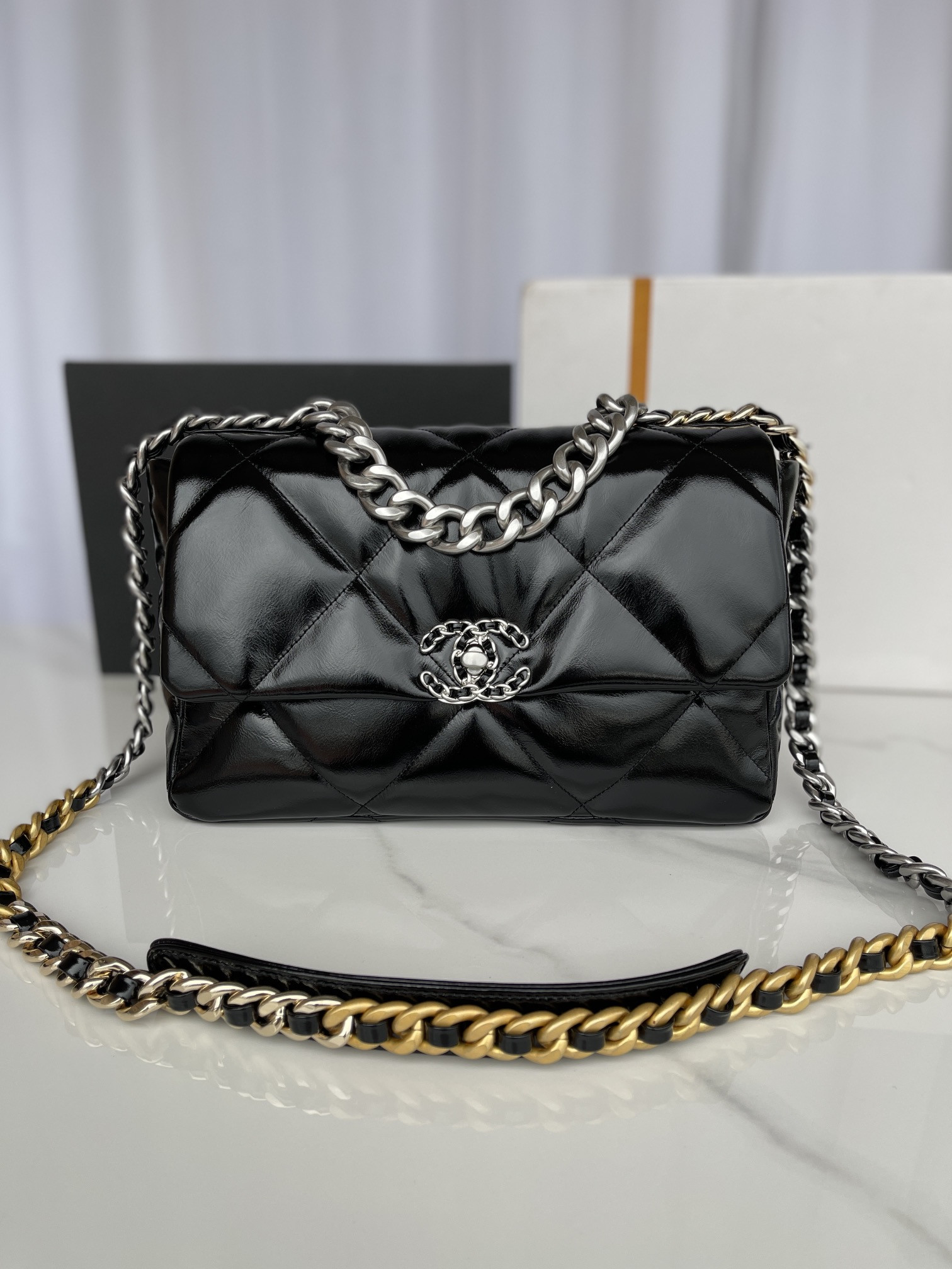 Ch**el 19 LARGE HANDBAG Shiny Leather, Gold-Tone, Silver-Tone & Ruthenium-Finish Metal Black 7.8 × 11.7 × 3.9 in