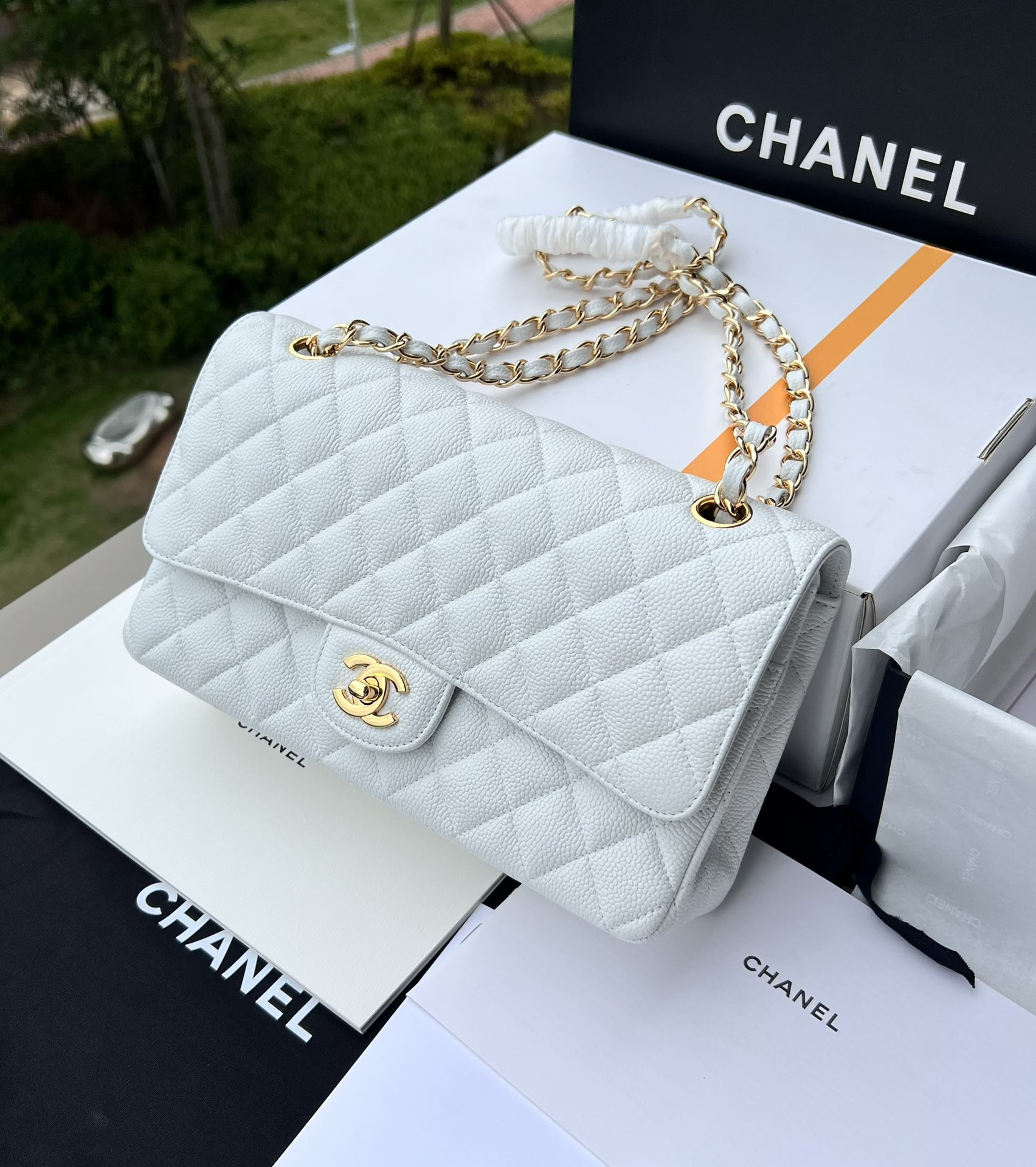 Ch**el CLASSIC HANDBAG GRAINED CALFSKIN & GOLD-TONE METAL WHITE 6 × 9.9 × 2.5 in