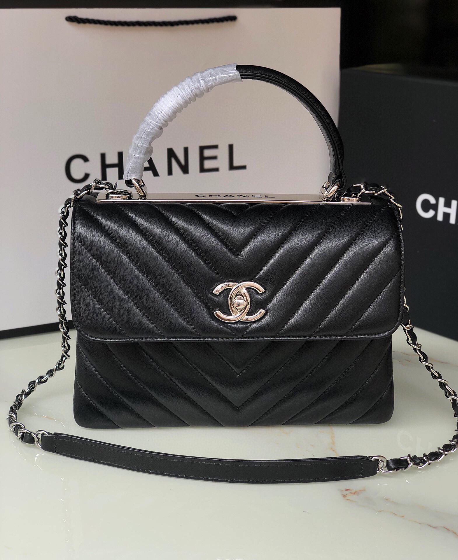 Ch**el FLAP BAG WITH TOP HANDLE 6.6 × 9.8 × 4.7 in